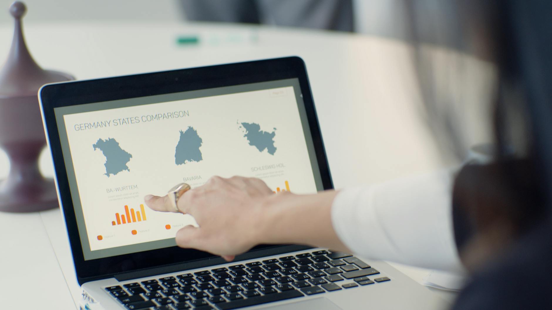 Laptop screen showing a side-by-side comparison of the best AI video editors including ChatCut, CapCut, and Descript interfaces